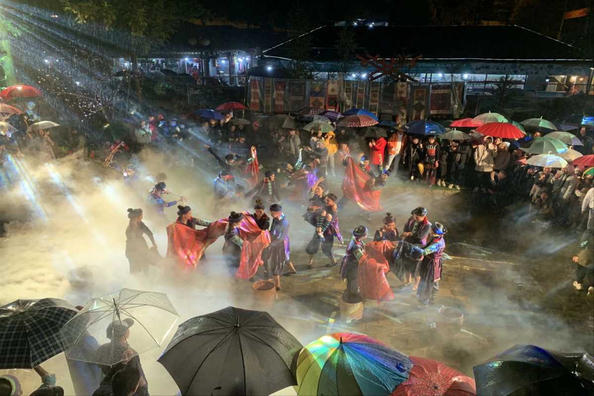 Sapa Love Market Vietnam night festival celebration Sapa Love Market Vietnam night festival fills with locals and tourists enjoying misty live performances and dances.