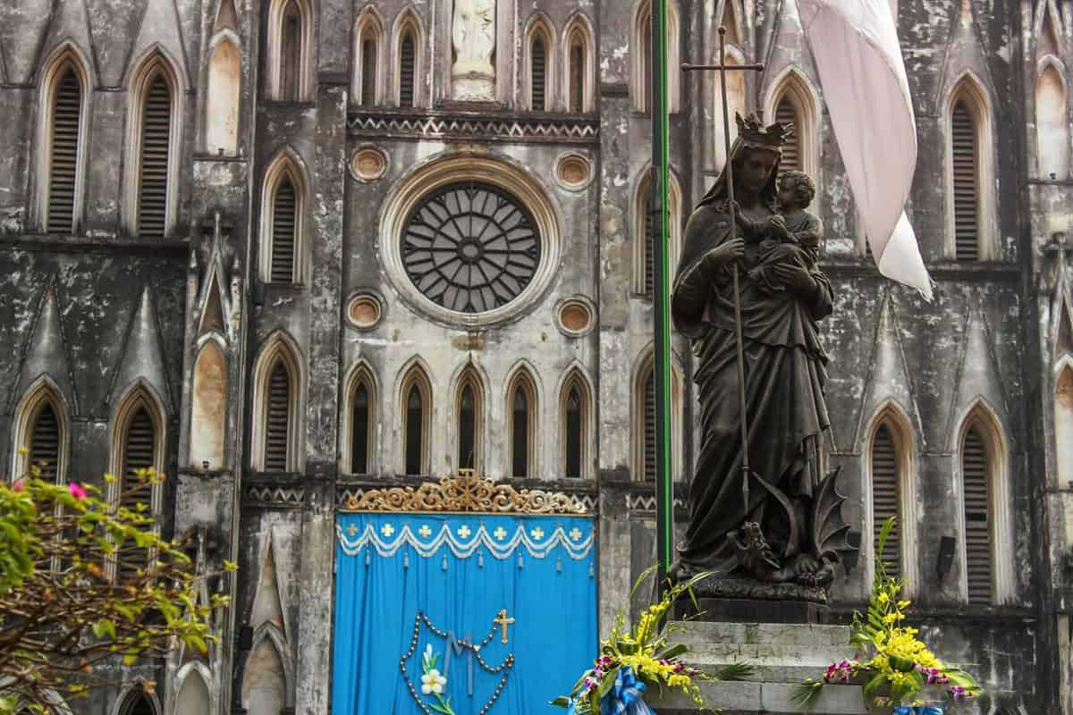 St. Joseph Cathedral Hanoi Evening Christmas Celebration Evening Christmas celebration at St. Joseph Cathedral Hanoi with festive lights and crowd