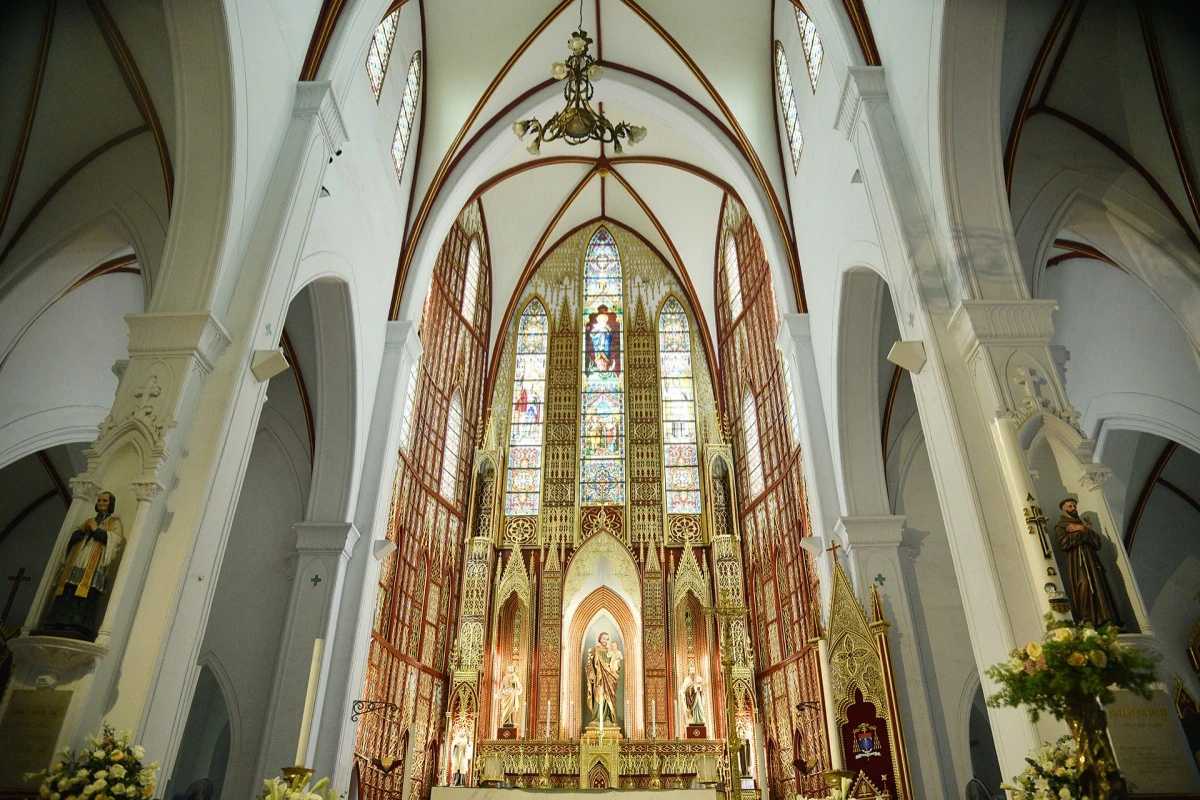 St. Joseph Cathedral Hanoi Roof and Trees View of cathedral roof and surrounding tree branches overhead