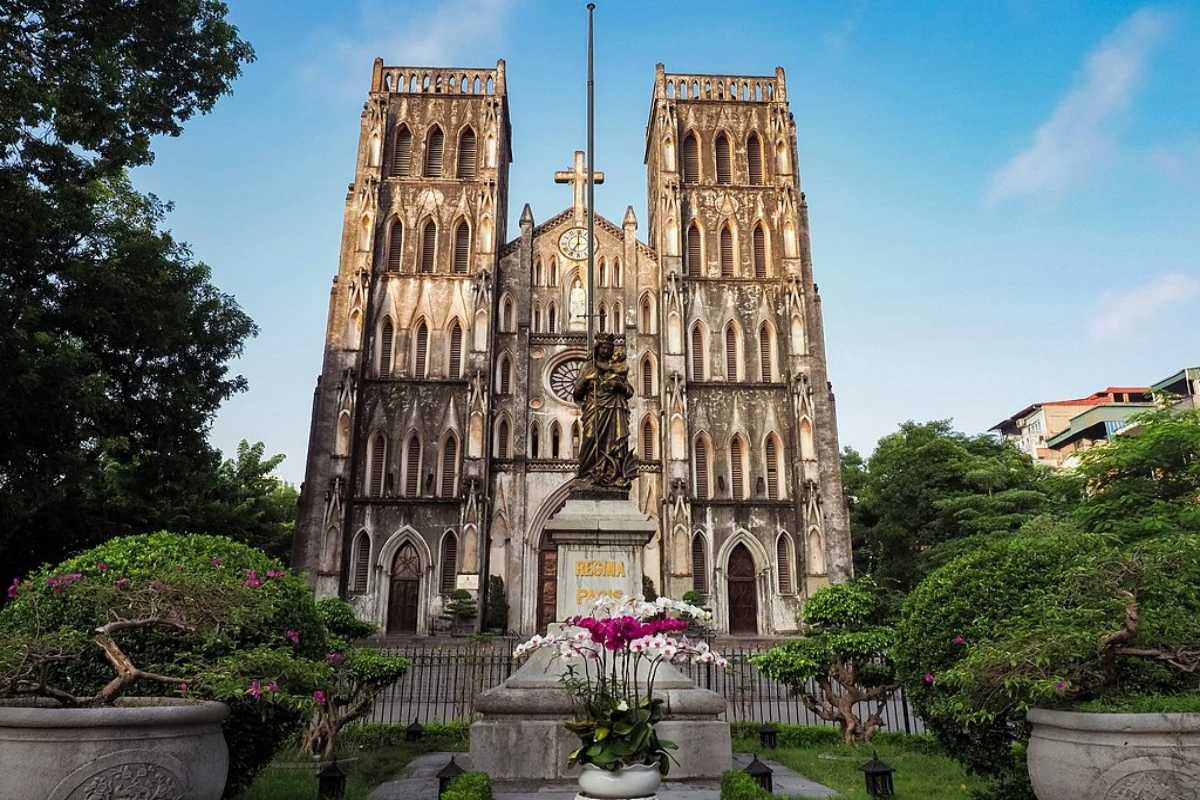 St. Joseph Cathedral Hanoi Twilight Front View Twilight exterior front view of St. Joseph Cathedral Hanoi with lights on