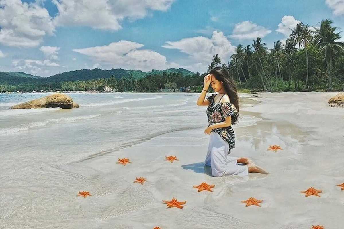 Starfish Beach Phu Quoc calm bay and white sand Calm bay with crystal-clear water and white sandy beach at Starfish Beach Phu Quoc