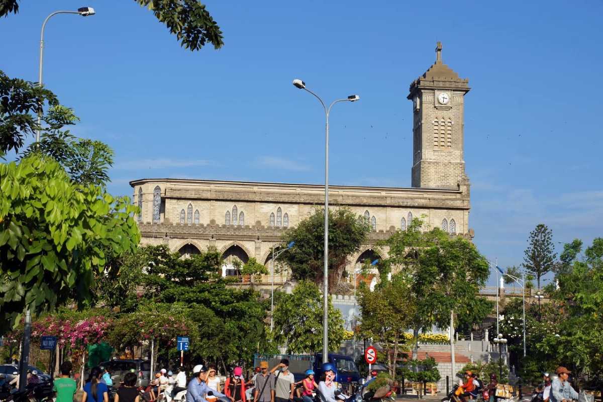 Stone Church Nha Trang Cathedral Front View Front facade and bell tower of Stone Church Nha Trang Cathedral with clear sky background
