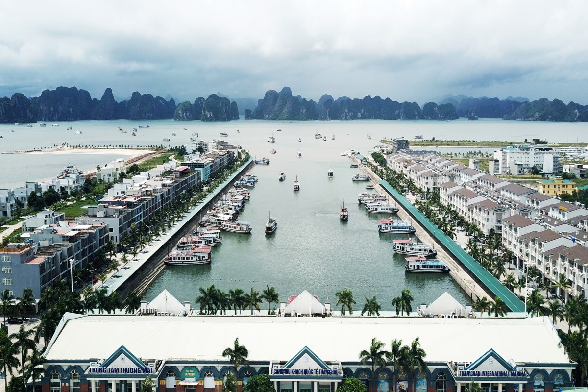 Tuan Chau Marina with Ha Long Bay limestone karsts in the backdrop