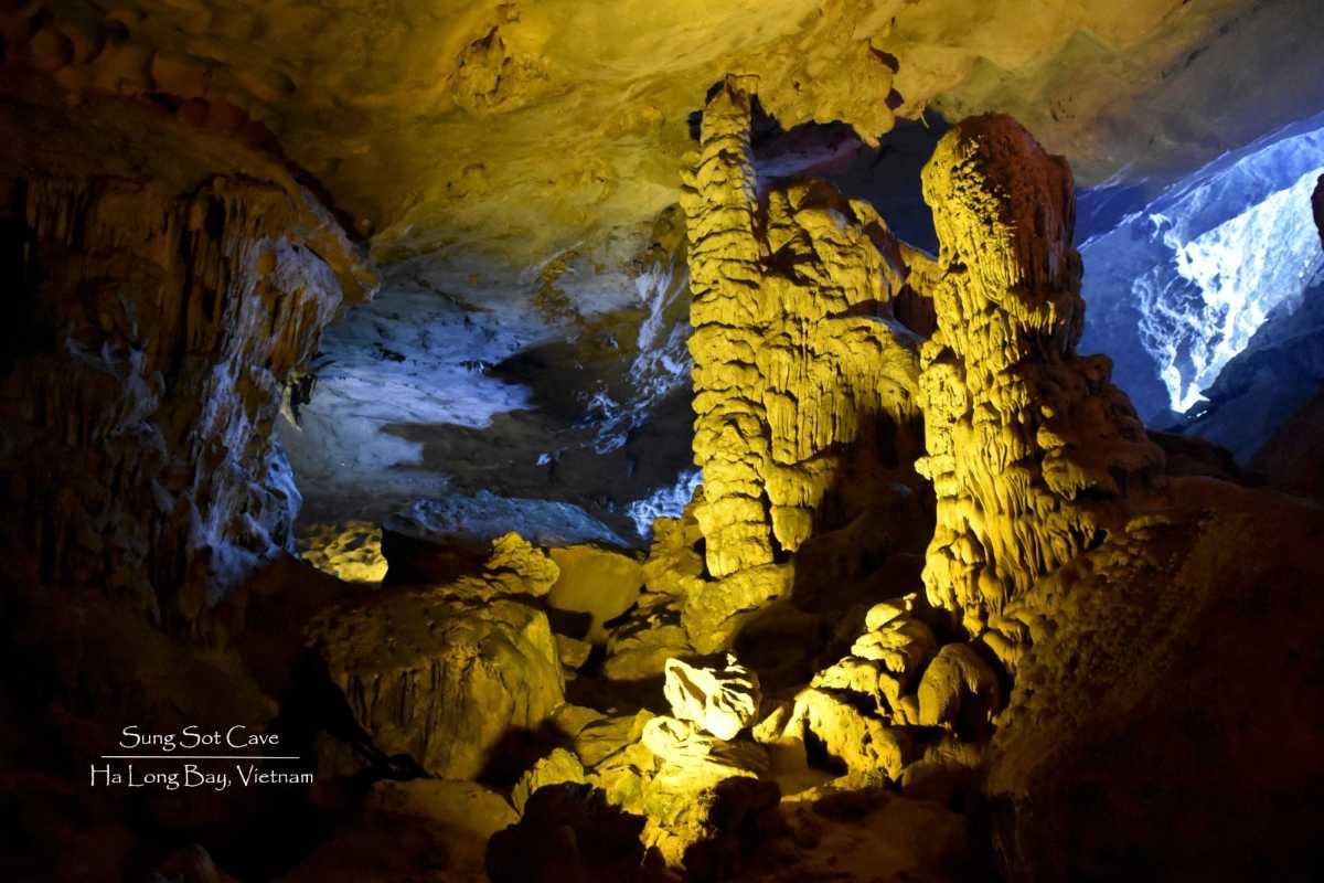 Sung Sot Cave Halong Bay natural light filtering into cave Natural light filtering into Sung Sot Cave Halong Bay, illuminating the cave’s interior and pathways.