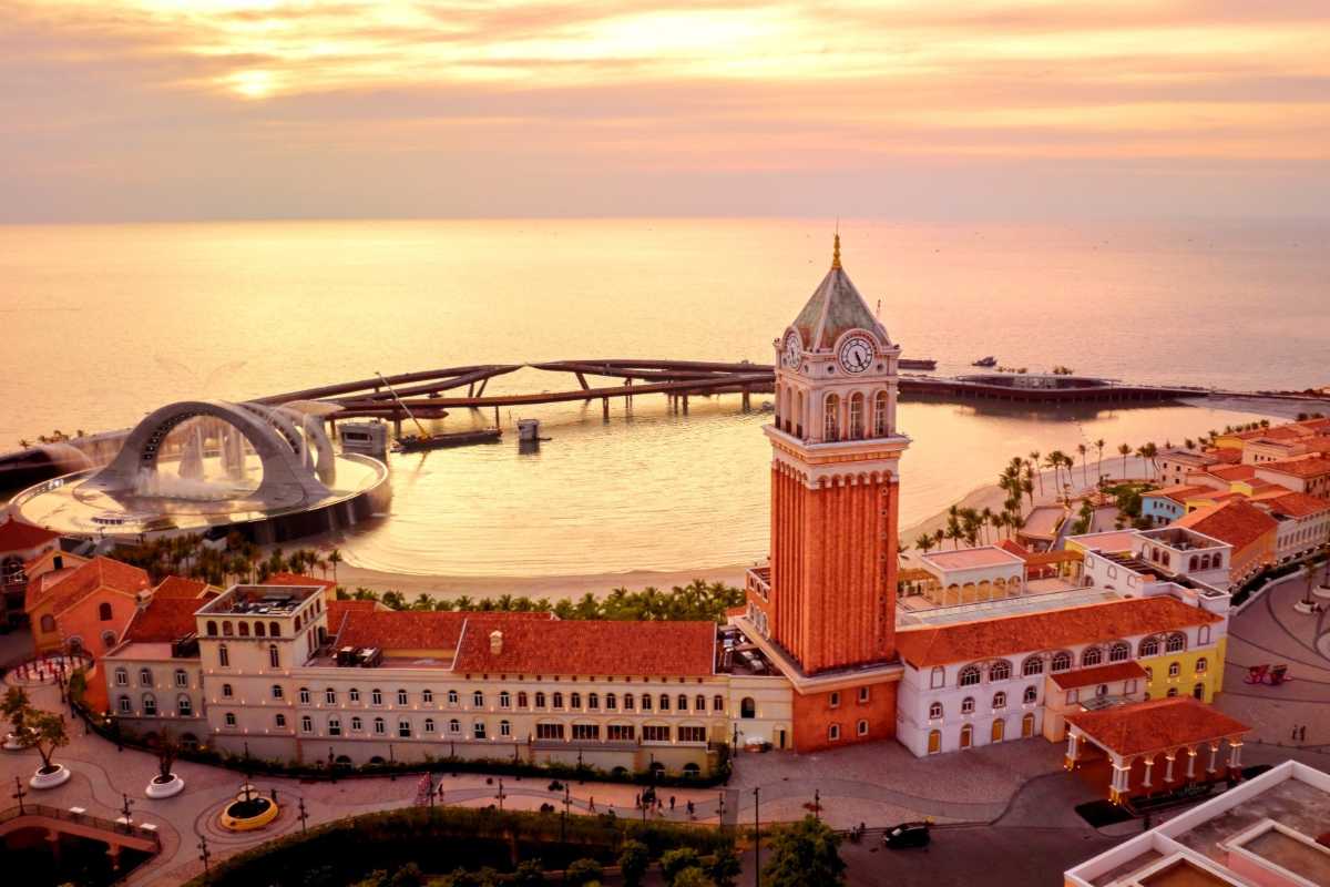 Clock Tower Phu Quoc with Colorful Sunset Sky Vibrant sunset sky illuminating Clock Tower Phu Quoc and the surrounding bay area