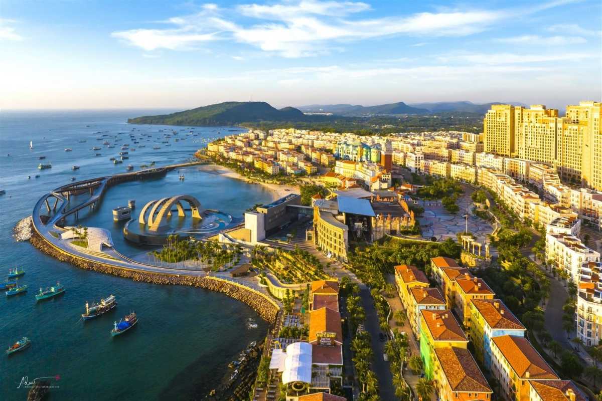 Sunset Town Phu Quoc Aerial View at Golden Hour Aerial view of Sunset Town Phu Quoc showcasing colorful buildings and calm sea at sunset