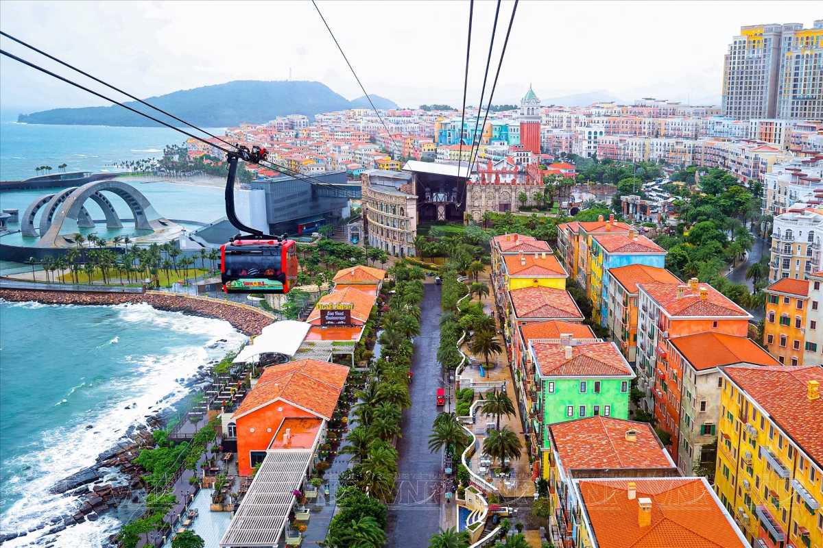 Cable Car Overlooking Sunset Town Phu Quoc Cable car ride above colorful rooftops and coastline in Sunset Town Phu Quoc