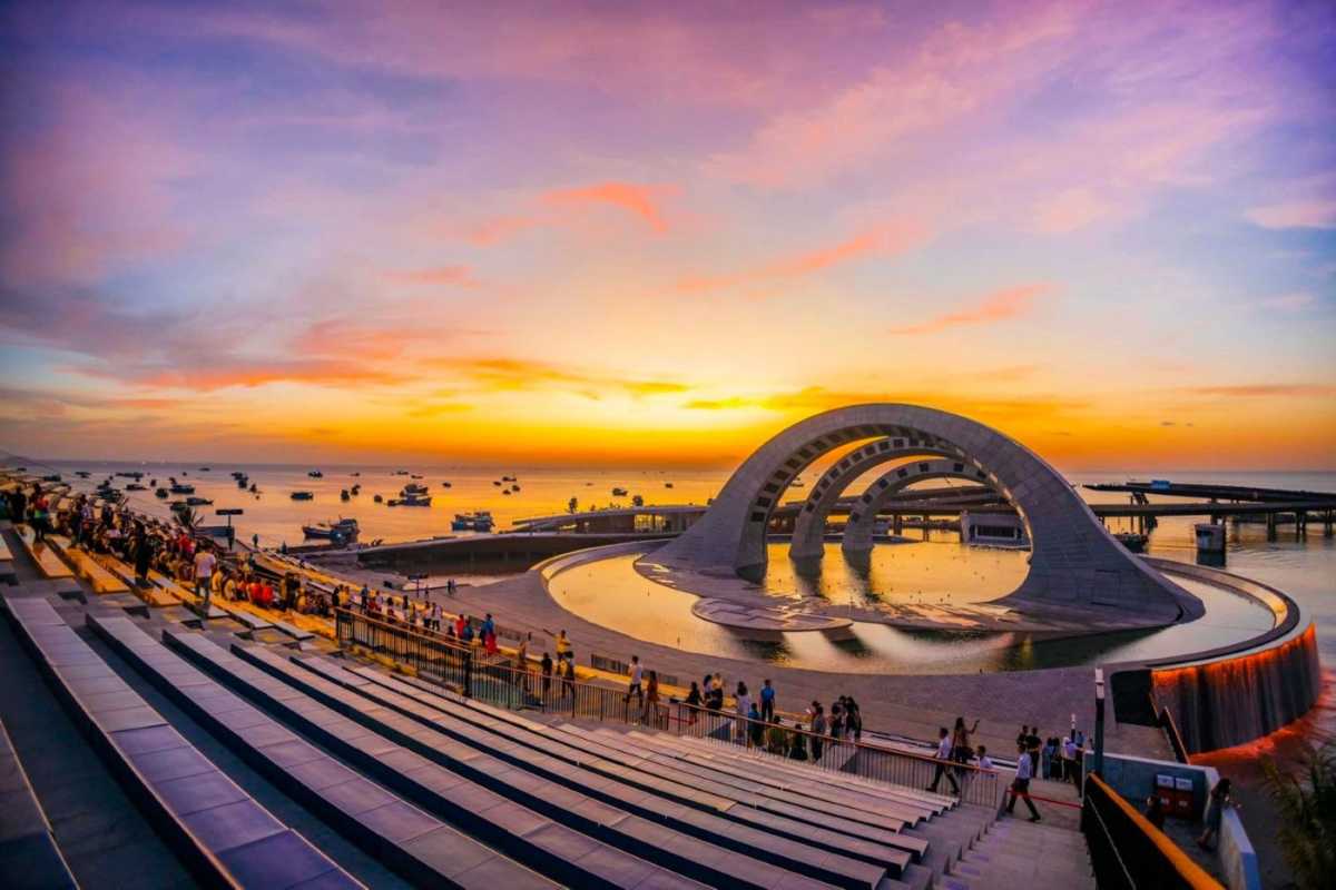 Coastal View of Sunset Town Phu Quoc Coastal view with Mediterranean-style buildings and the sea in Sunset Town Phu Quoc