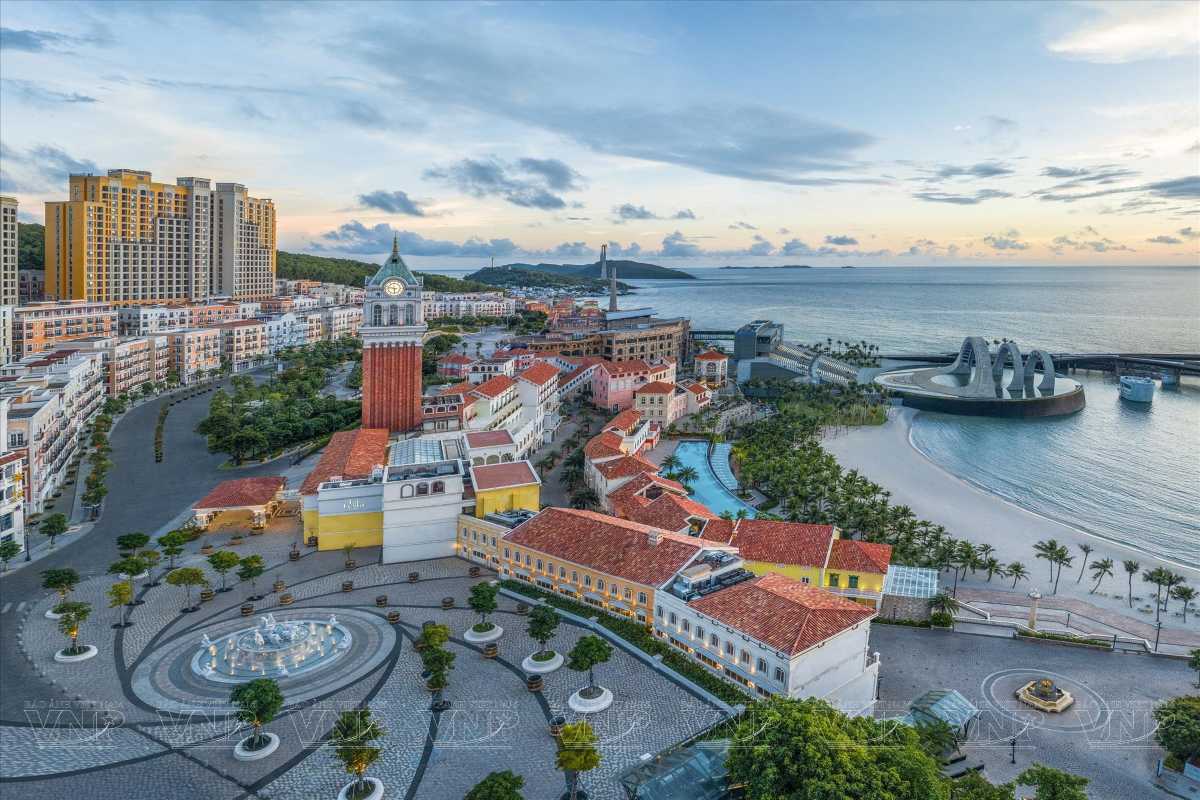 Sunset Town Phu Quoc Colonnade and Fountain Central square colonnade and fountain area in Sunset Town Phu Quoc during sunset