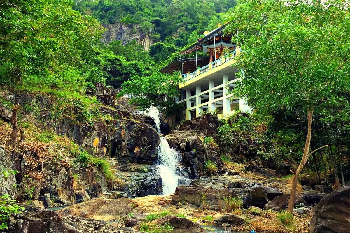 Waterfall beside Suoi Do Pagoda in Nha Trang Natural waterfall cascading beside Suoi Do Pagoda, adding to the peaceful atmosphere of the spiritual site