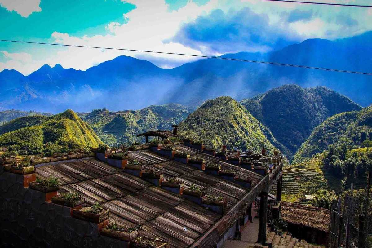 Ta Van Village Sapa Traditional Stilt Houses Traditional stilt houses in Ta Van Village Sapa surrounded by terraced rice fields and lush vegetation