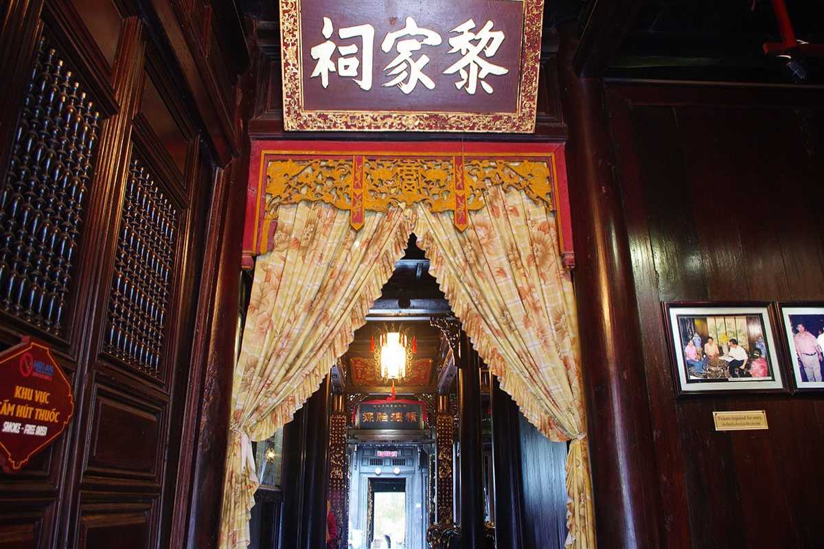 Entrance Hallway of Tan Ky Ancient House with Visitors Visitors entering the traditional Tan Ky Ancient House in Hoi An