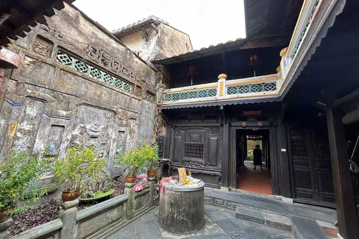 Historic Exterior Facade of Tan Ky Ancient House, Hoi An Exterior view of the historic facade of Tan Ky Ancient House with its wooden panels