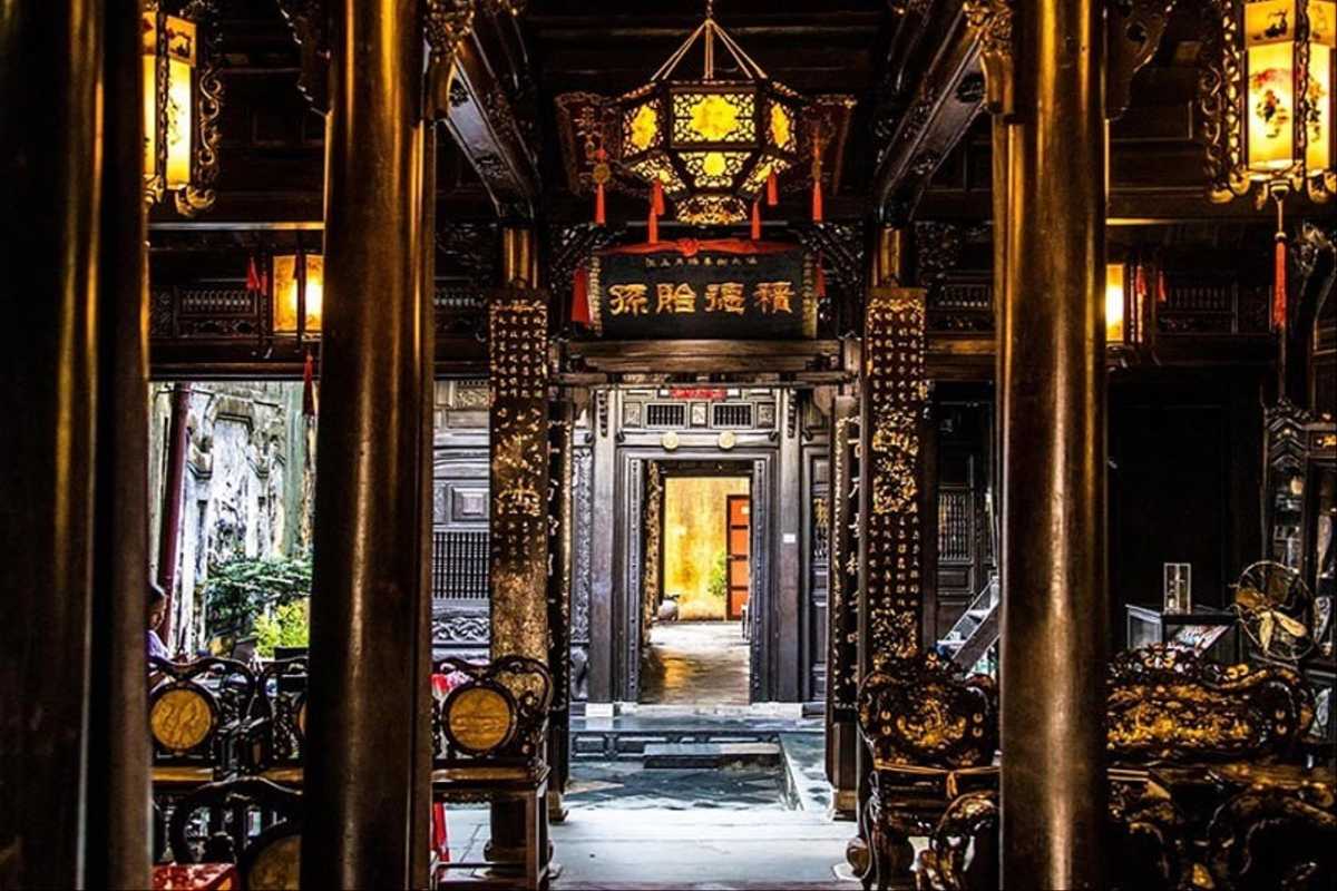 Ornate Interior View of Tan Ky Ancient House Hoi An Ornate interior view of Tan Ky Ancient House featuring traditional wooden pillars and lanterns