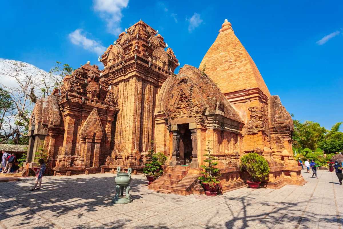 Tháp Bà Ponagar tower structures close-up Close-up of Tháp Bà Ponagar towers with clear skies, red bricks, and historic details in Nha Trang