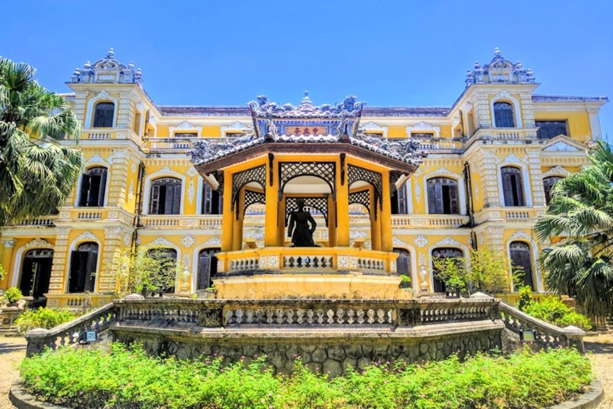 The facade of An Dinh Palace in Hue with the Khai Tuong Pavilion, a fusion of European and Vietnamese architectural styles.