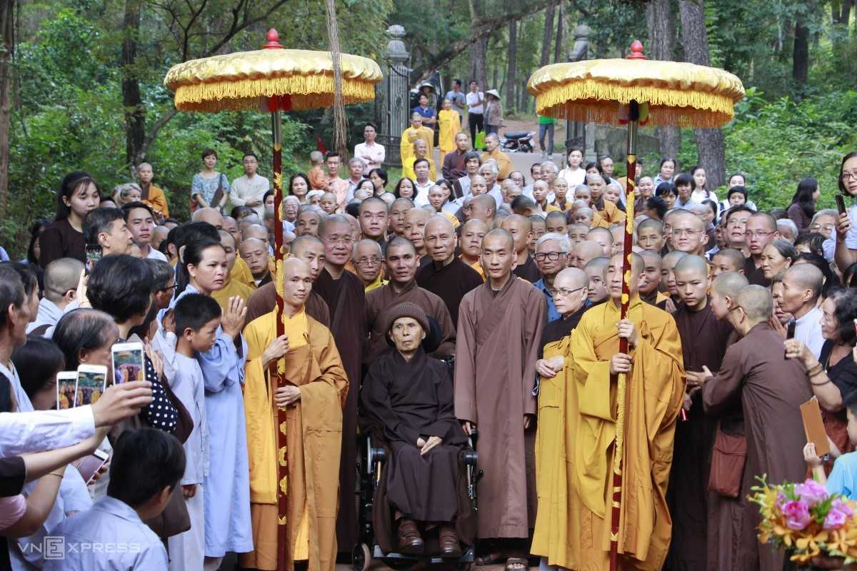 Zen Master Thich Nhat Hanh at Tu Hieu Pagoda Zen Master Thich Nhat Hanh surrounded by monks and followers during a ceremony at Tu Hieu Pagoda.