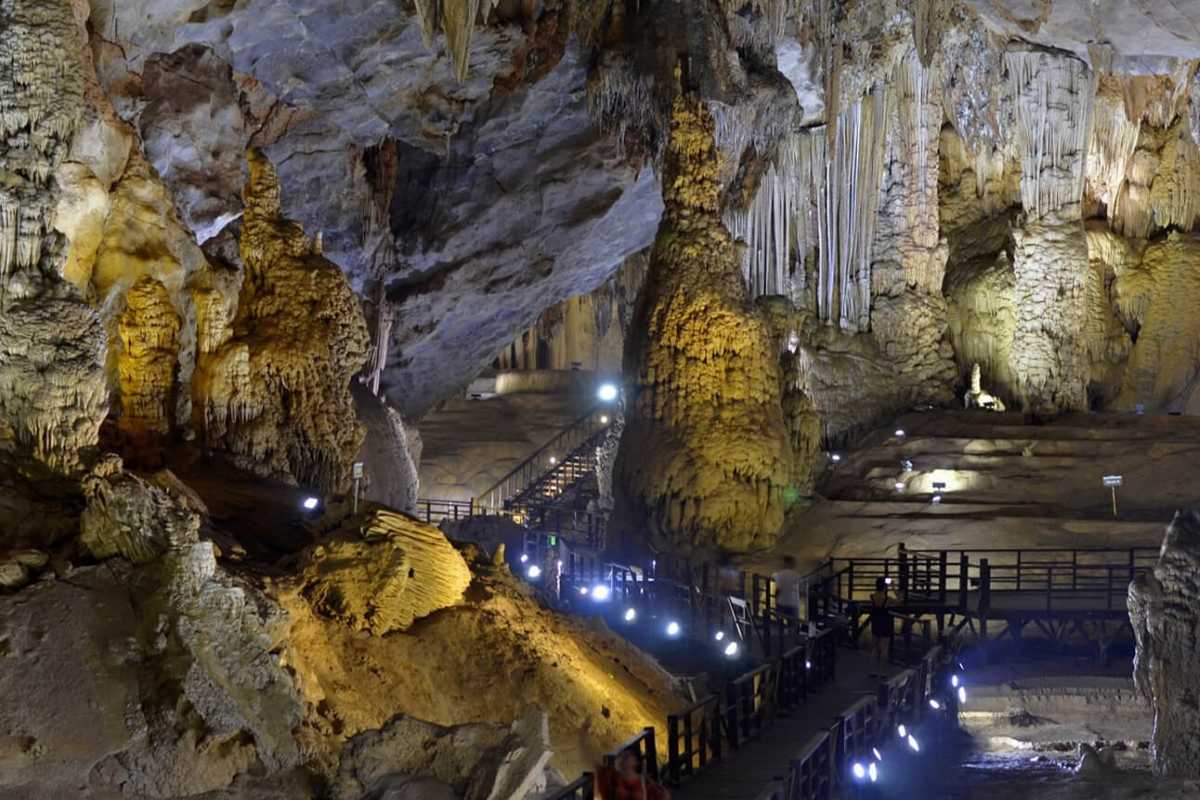 Thien Cung Cave Halong Bay colorful lighting display Thien Cung Cave Halong Bay showcases a colorful lighting display enhancing the natural beauty of cave formations