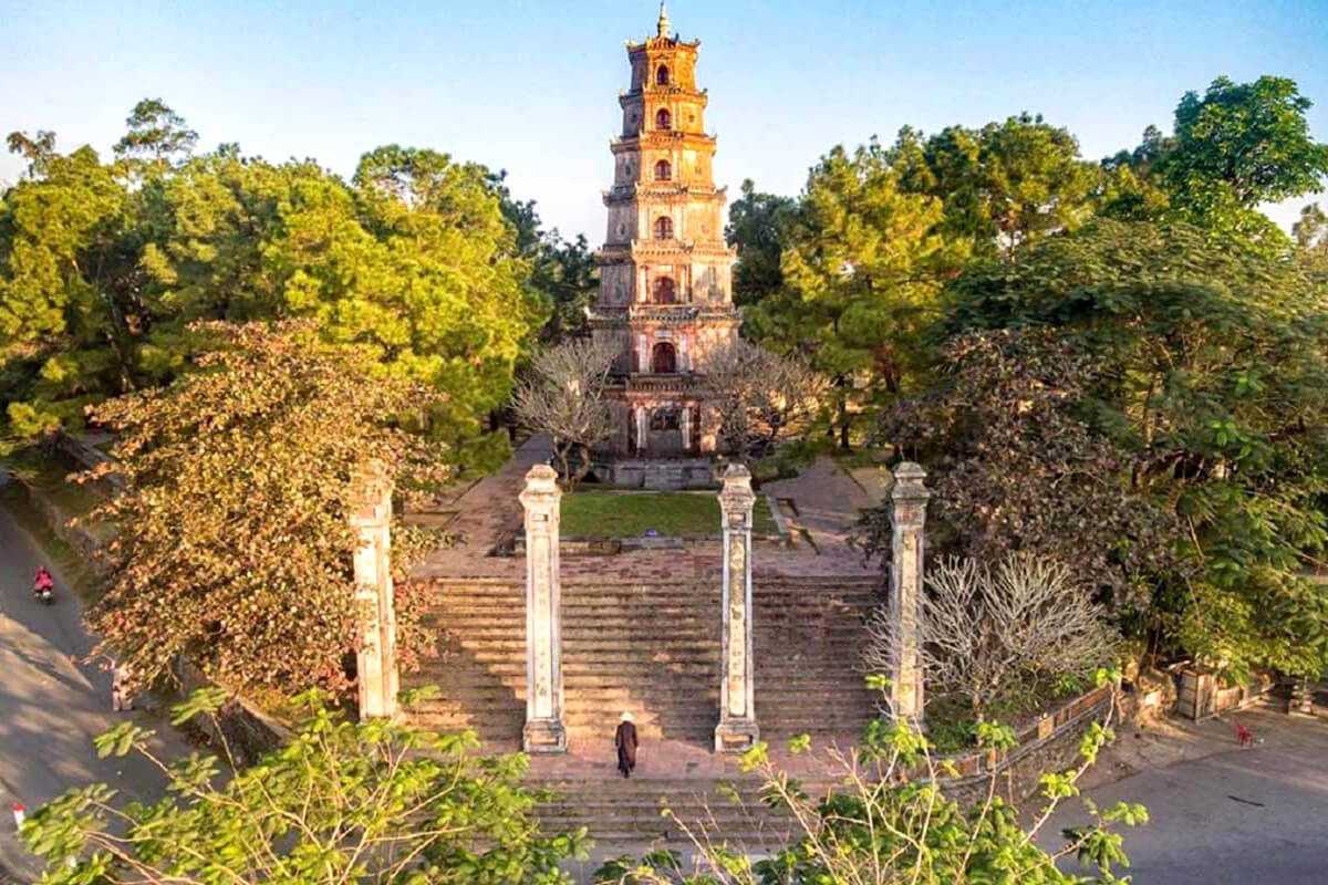 Grand entrance steps of Thien Mu Pagoda with Phuoc Duyen Tower Entrance staircase of Thien Mu Pagoda with Phuoc Duyen Tower rising in the background, a key spiritual site and visual highlight of Hue.