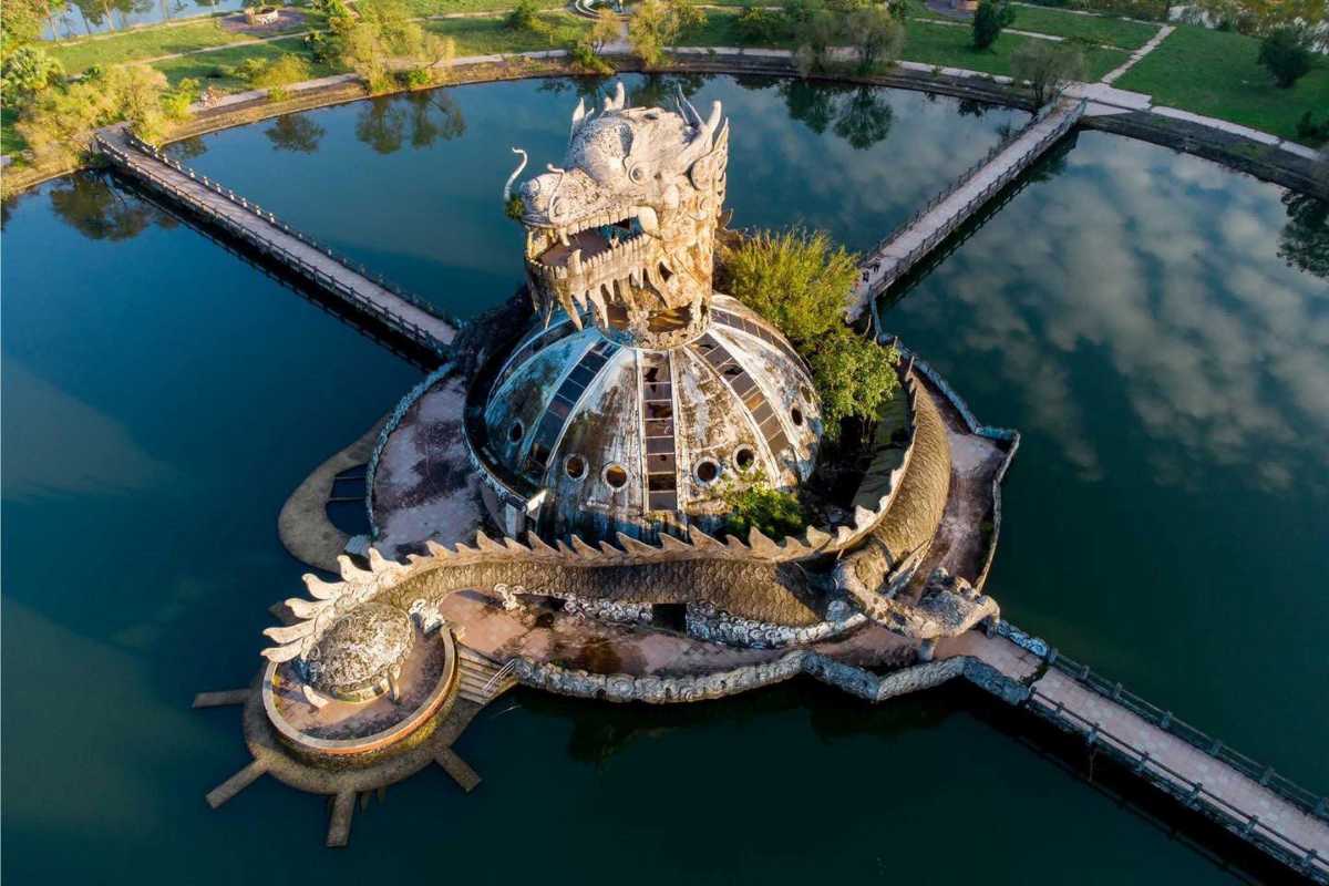 Aerial View of Dragon Dome Thuy Tien Lake Aerial perspective of the dragon dome rising above the water at Thuy Tien Lake Abandoned Water Park Hue