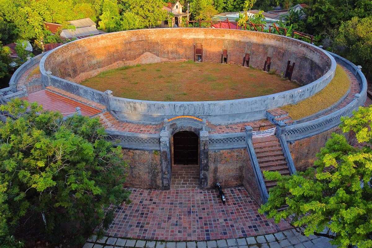 Tiger Arena Hue aerial detail of central arena and seating areas Tiger Arena Hue’s central arena and surrounding seating are visible in aerial detail, highlighting the unique circular design and preserved walls.