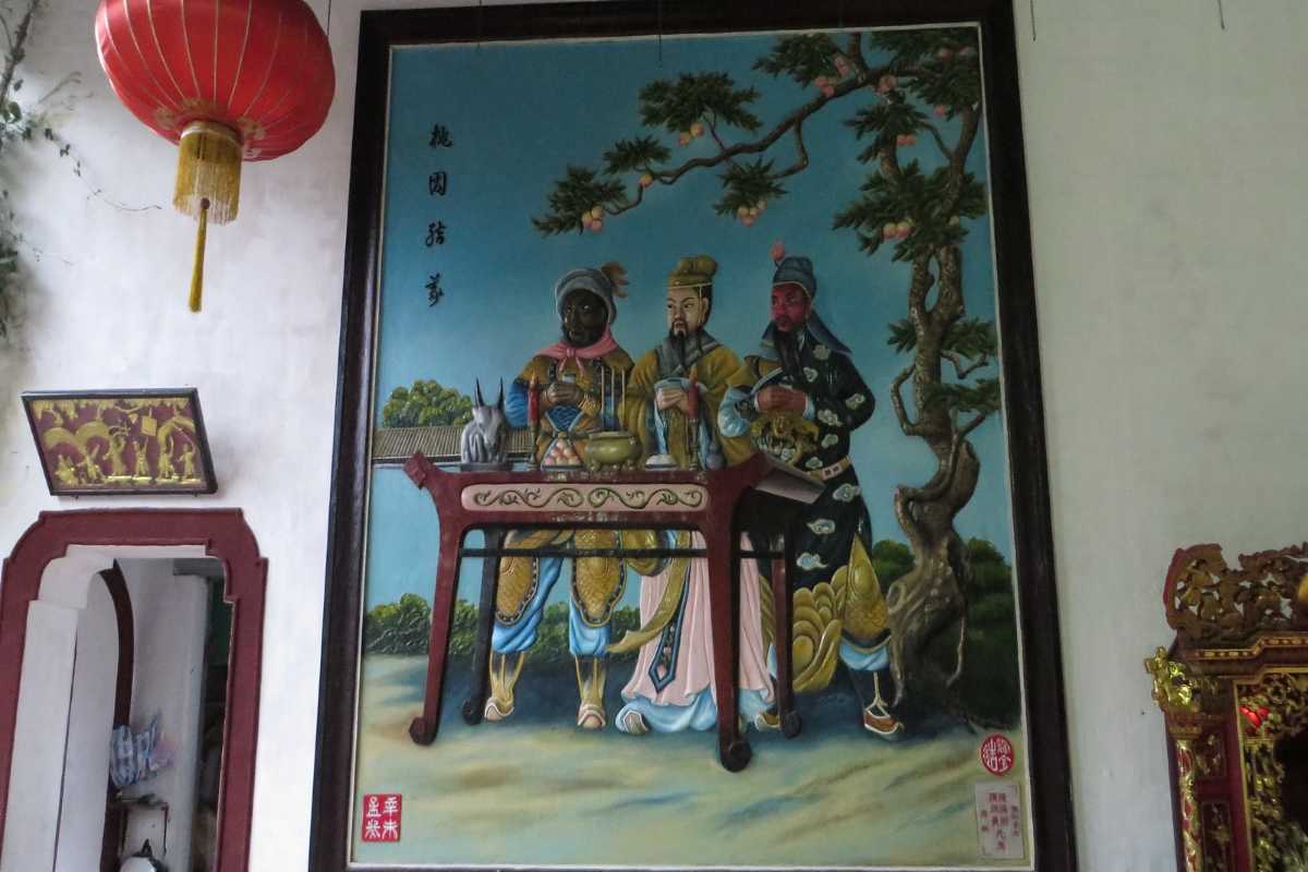 Traditional Wall Painting Inside Cantonese Assembly Hall Traditional colorful wall painting depicting Chinese figures inside Cantonese Assembly Hall