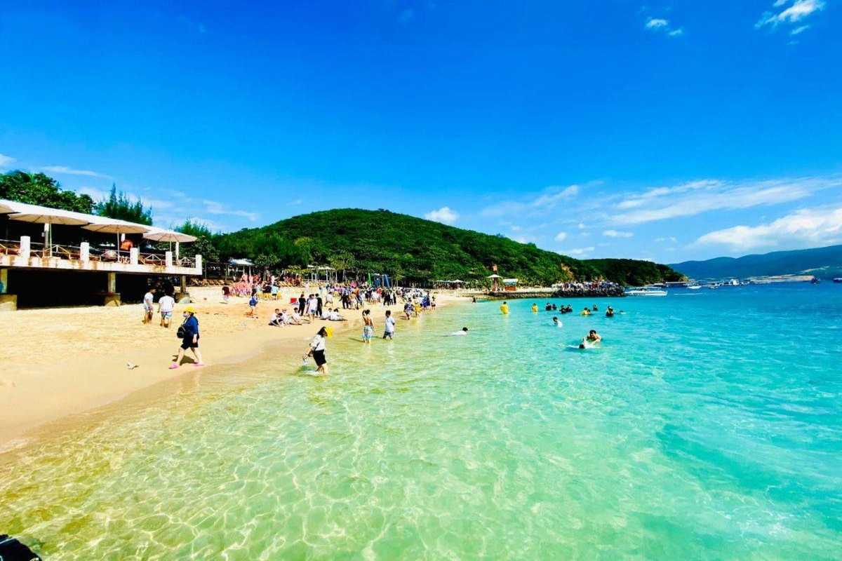 Tranh Beach Nha Trang Scenic Aerial View Aerial view showing the lush greenery and sandy beach at Tranh Beach Nha Trang