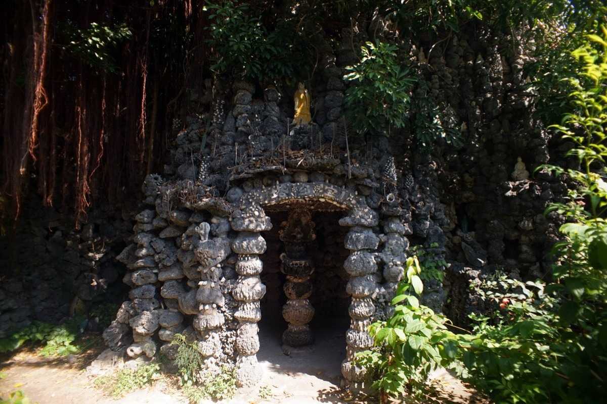 Tu Van Pagoda Nha Trang Entrance Gate and Surrounding Greenery Entrance gate to Tu Van Pagoda surrounded by lush green trees and garden in Nha Trang