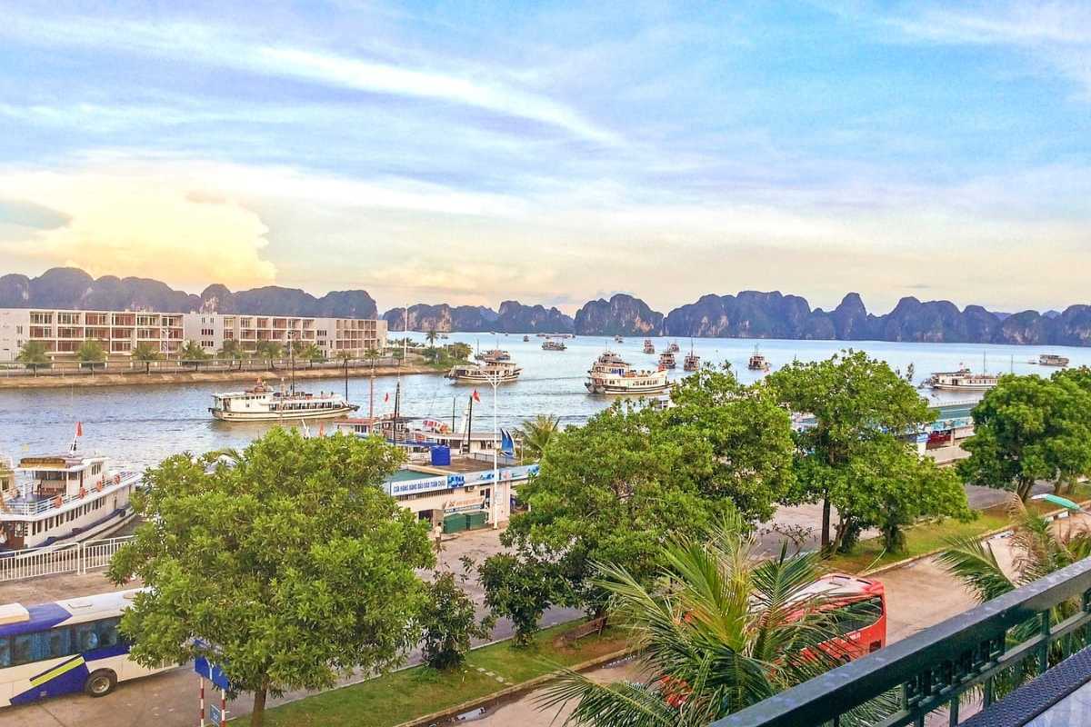 Tuan Chau Harbor Ha Long Bay boat traffic scene Boat traffic at Tuan Chau Harbor Ha Long Bay showing many boats navigating the calm waters