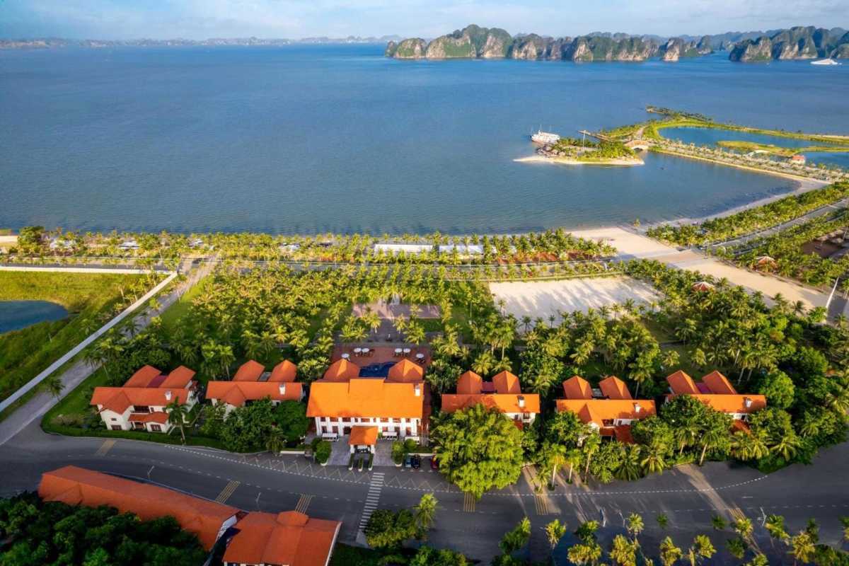 Tuan Chau Harbor Halong golf course and bay view Scenic golf course surrounded by palm trees with panoramic views of Ha Long Bay at Tuan Chau Harbor Halong.
