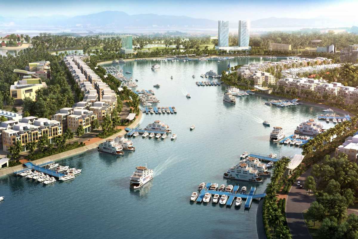 Tuan Chau Harbor Halong residential area and marina Waterfront residential area beside the marina at Tuan Chau Harbor Halong, with boats docked along canals.