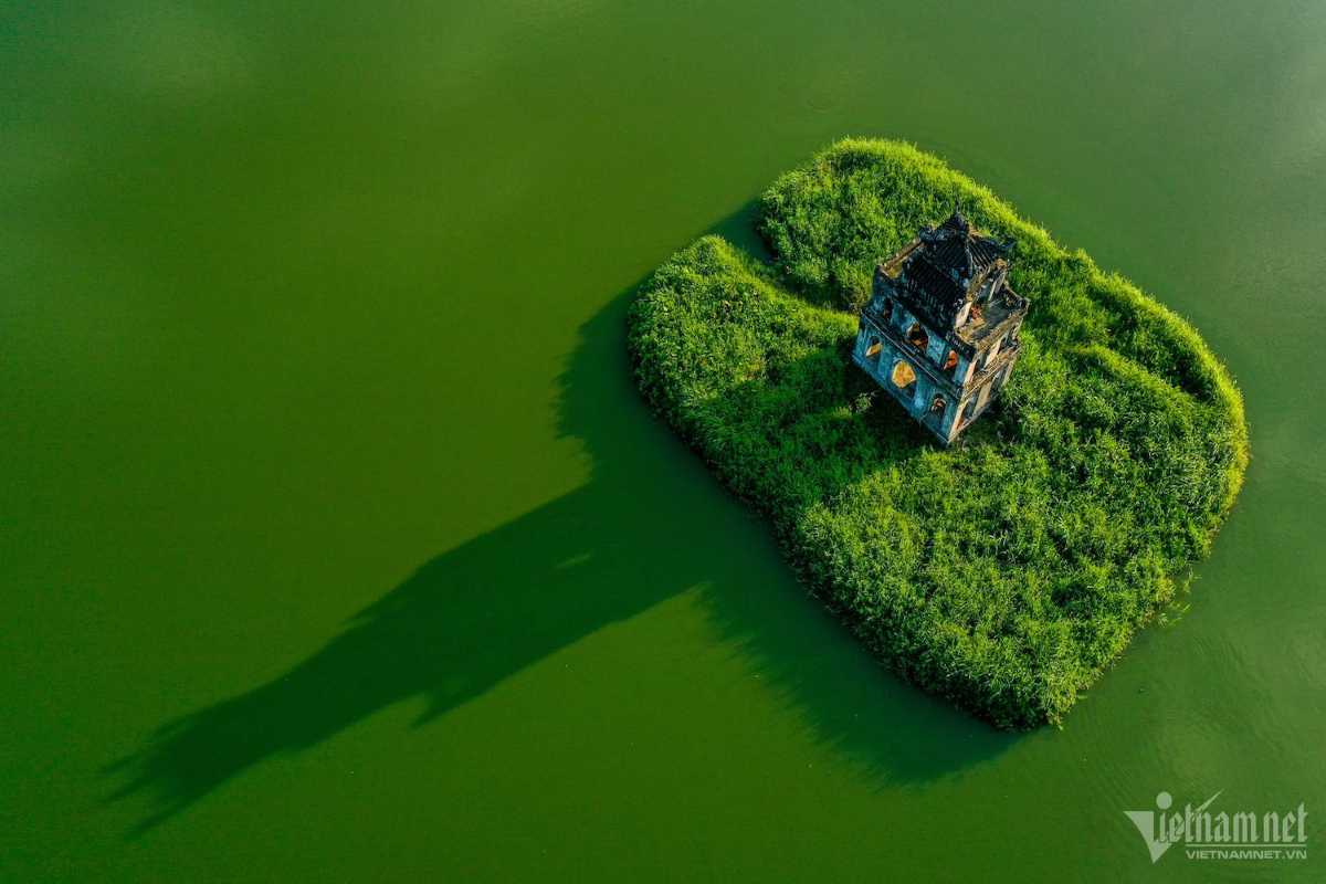 Turtle Tower Hanoi on a Small Island in Hoan Kiem Lake Turtle Tower Hanoi standing on a small grassy island in Hoan Kiem Lake