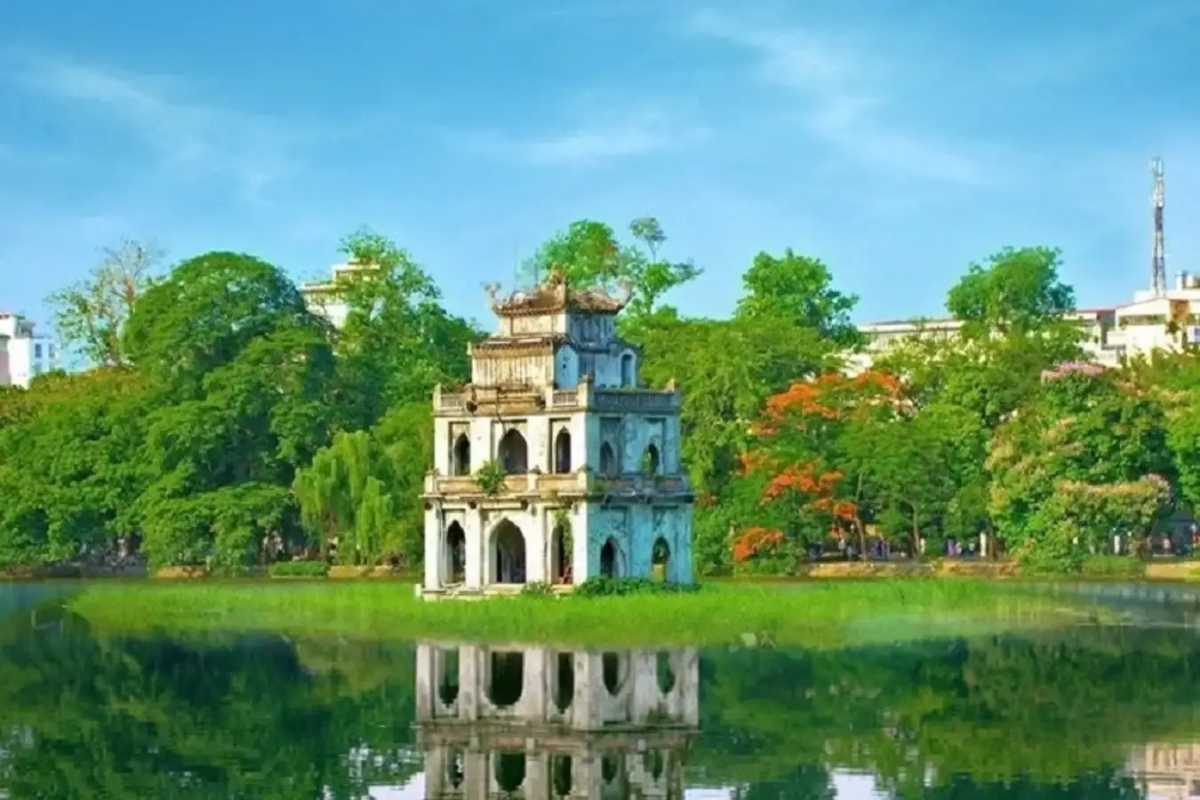 Twilight View of Turtle Tower at Hoan Kiem Lake Twilight shot of Turtle Tower lit against fading light on Hoan Kiem Lake