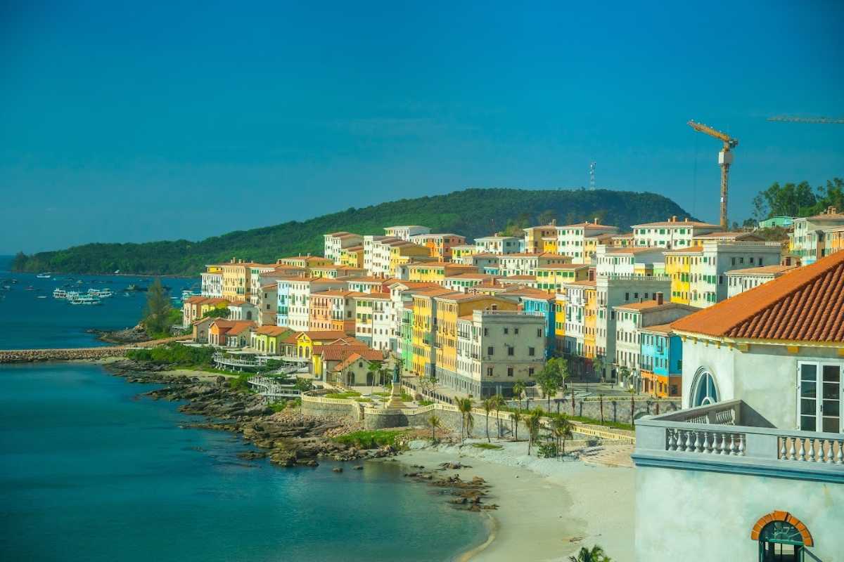 Sunset Town Phu Quoc Vibrant Coastal Neighborhood Vibrant coastal neighborhood in Sunset Town Phu Quoc with colorful buildings and greenery