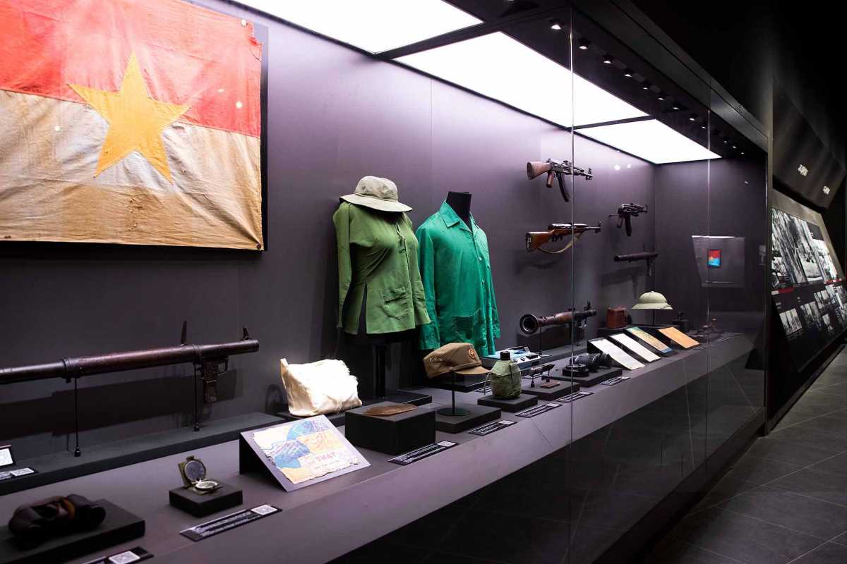 Vietnam Military History Museum Exhibition Hall Inside exhibition hall showing photographs and exhibits at Vietnam Military History Museum