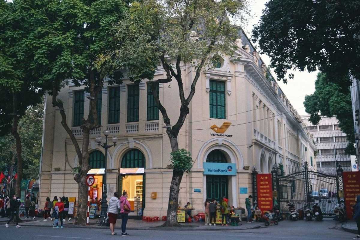 Hanoi French Quarter Vietnam Post Office Vietnam Post Office building with yellow walls and green windows in Hanoi French Quarter