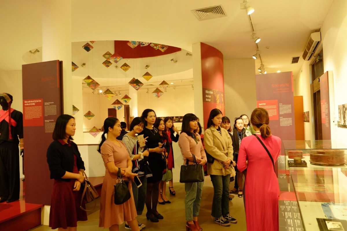 Vietnamese Women’s Museum Guided Tour Group of visitors listening to a guide inside the Vietnamese Women’s Museum in Hanoi