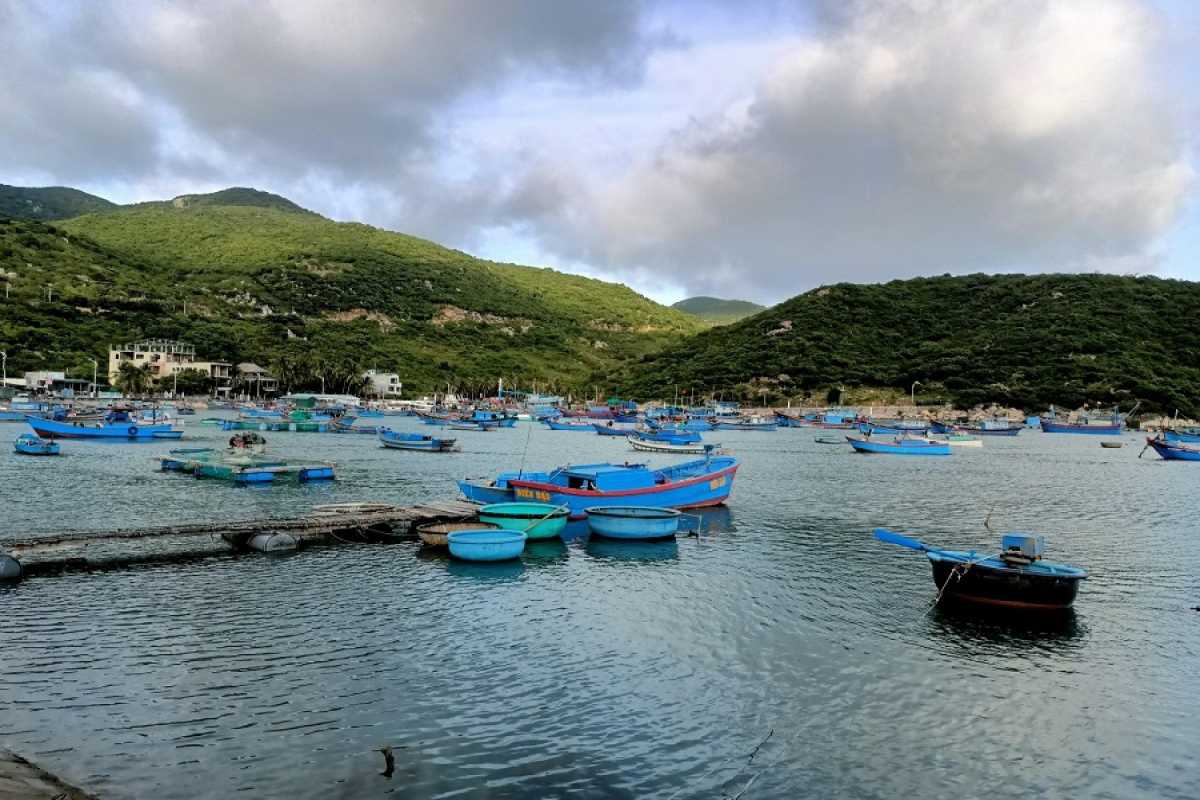 Vinh Hy Bay Rocky Coastal Landscape Rocky coastal landscape of Vinh Hy Bay with turquoise tide pools and clear skies