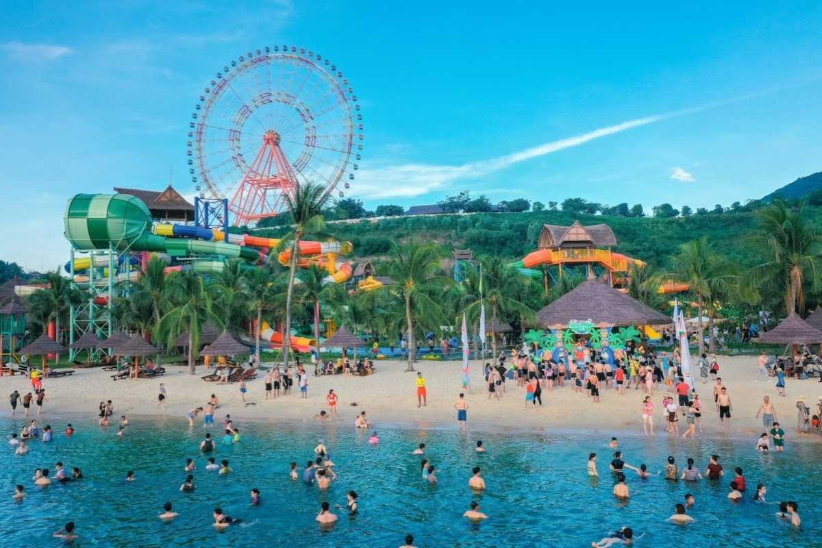 Family Activities at VinWonders Hon Tre Families enjoying waterpark, beach, and rides at VinWonders amusement park on Hon Tre Island
