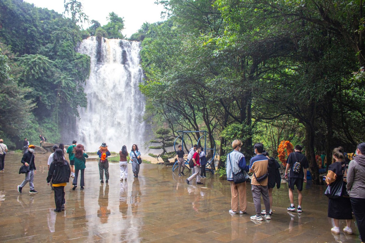 Visitors enjoying the scenery at Bobla Waterfall