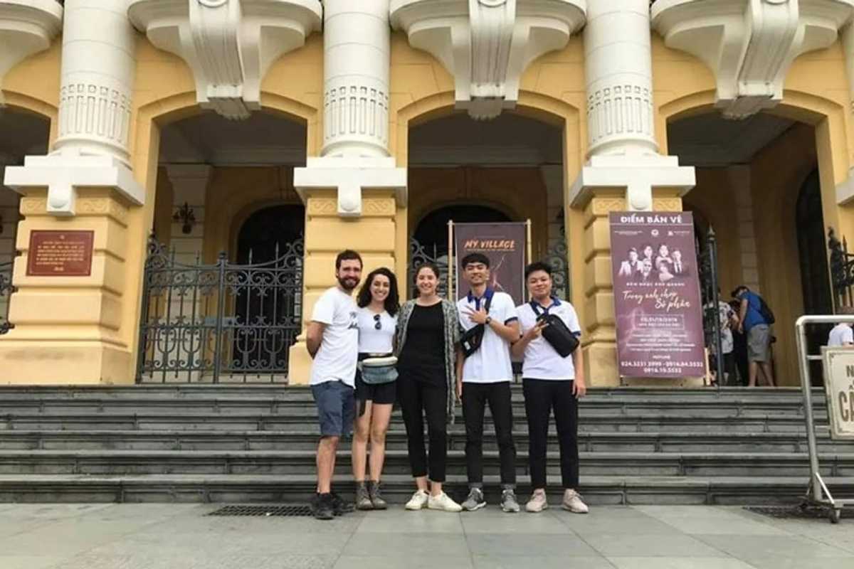 Hanoi French Quarter Visitors at Colonial Building Tourists posing in front of colonial building in Hanoi French Quarter