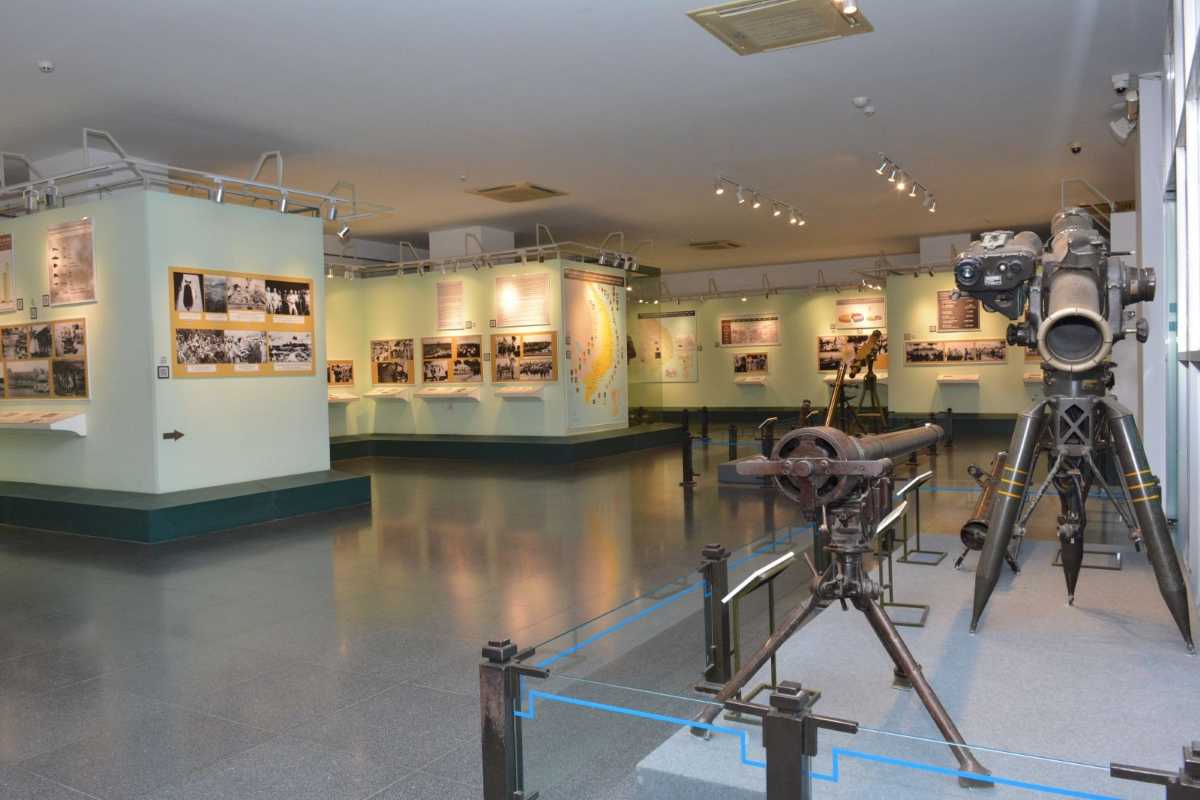 War Remnants Museum Historical Weapons and Equipment Exhibit Display of historical weapons and military equipment inside the War Remnants Museum