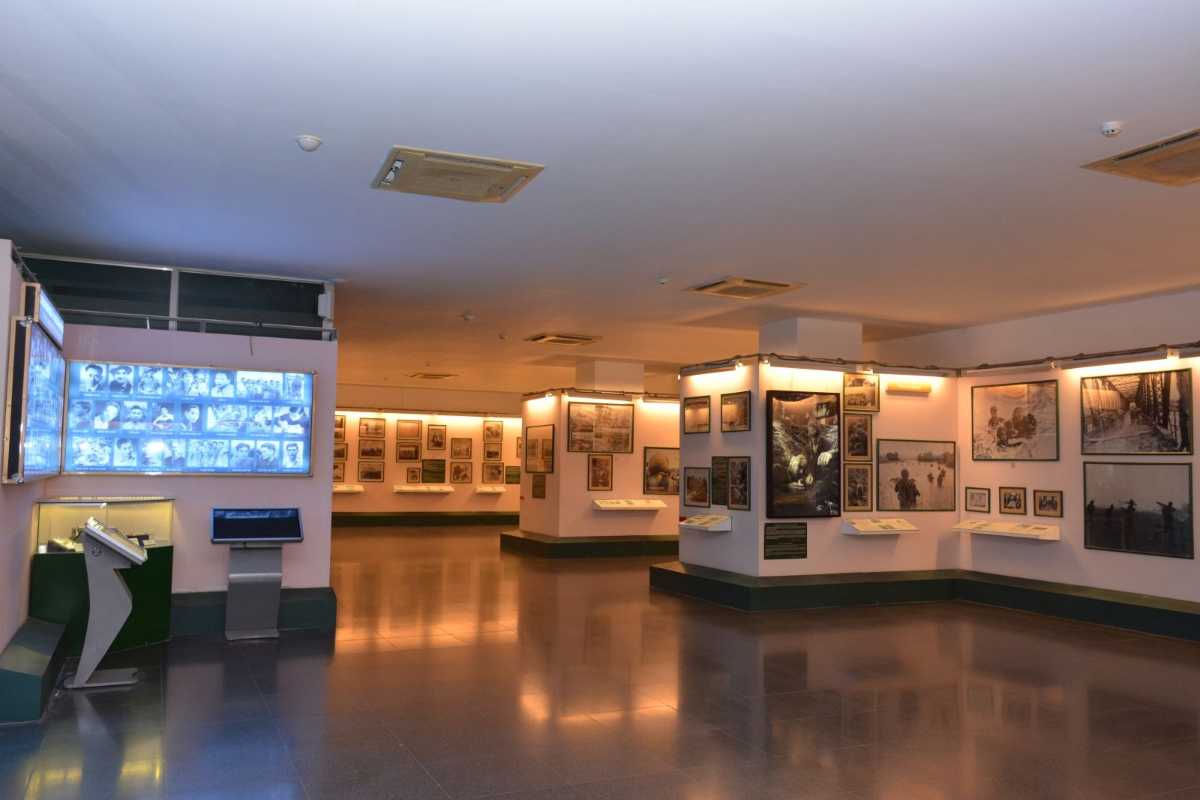 War Remnants Museum Illuminated Historical Exhibit Illuminated indoor exhibits showing photographs and documents about the Vietnam War at the War Remnants Museum