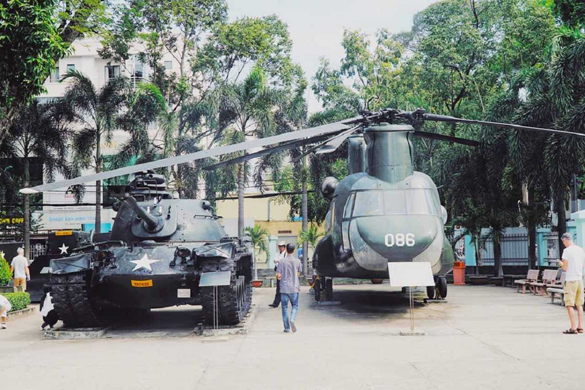 War Remnants Museum Tank and Helicopter Outdoor Display Tank and helicopter displayed outdoors at the War Remnants Museum showing military vehicles from the Vietnam War