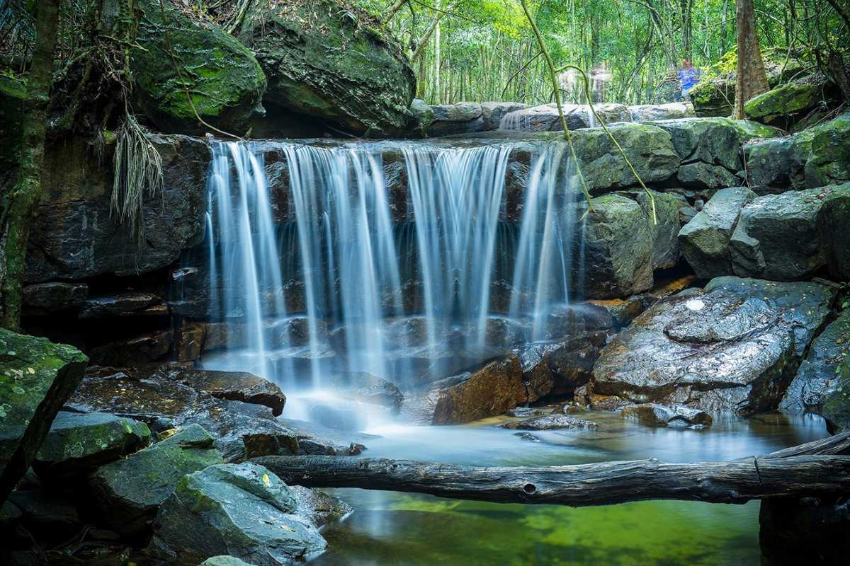 Waterfalls in Phu Quoc National Park Waterfalls in Phu Quoc National Park surrounded by lush tropical greenery, ideal for eco-tourism.