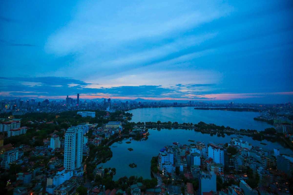 West Lake Hanoi at Twilight West Lake Hanoi panorama at twilight with city lights reflecting on the water