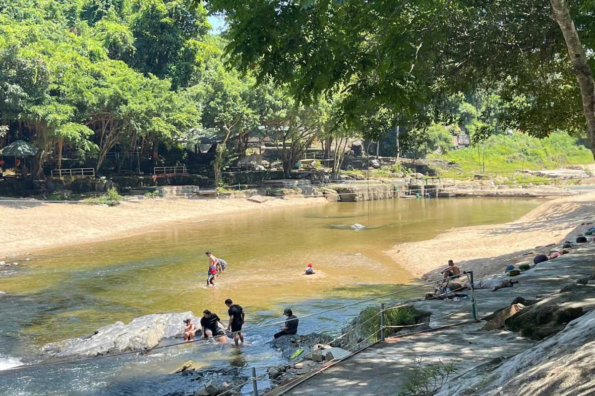Shallow Riverbank at Yang Bay Children and families enjoy shallow water play at the riverbank of Yang Bay Waterfall