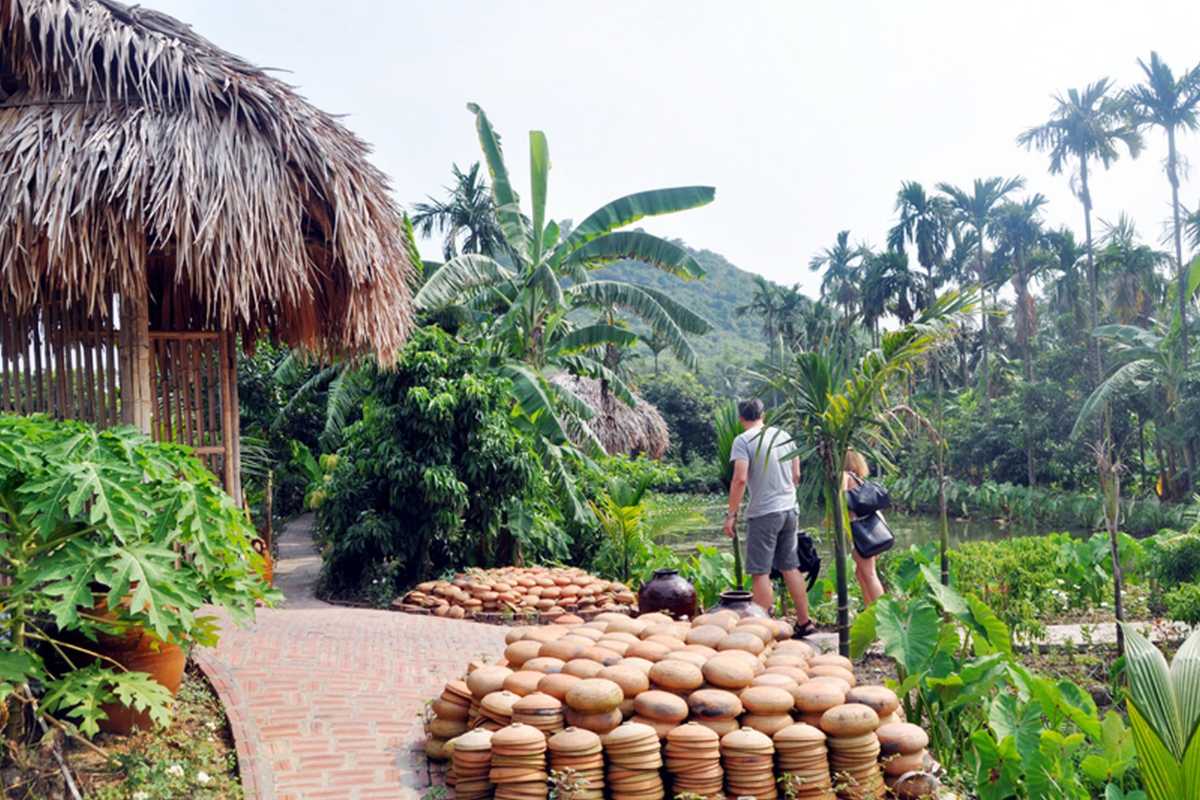 Traditional Vietnamese Village Entrance at Yen Duc Main entrance gate to Yen Duc Village, featuring traditional architecture and welcoming atmosphere.