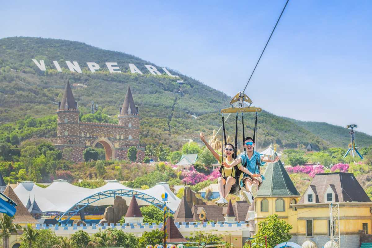 Ziplining Adventure at VinWonders Nha Trang Visitors ziplining over VinWonders Nha Trang theme park grounds