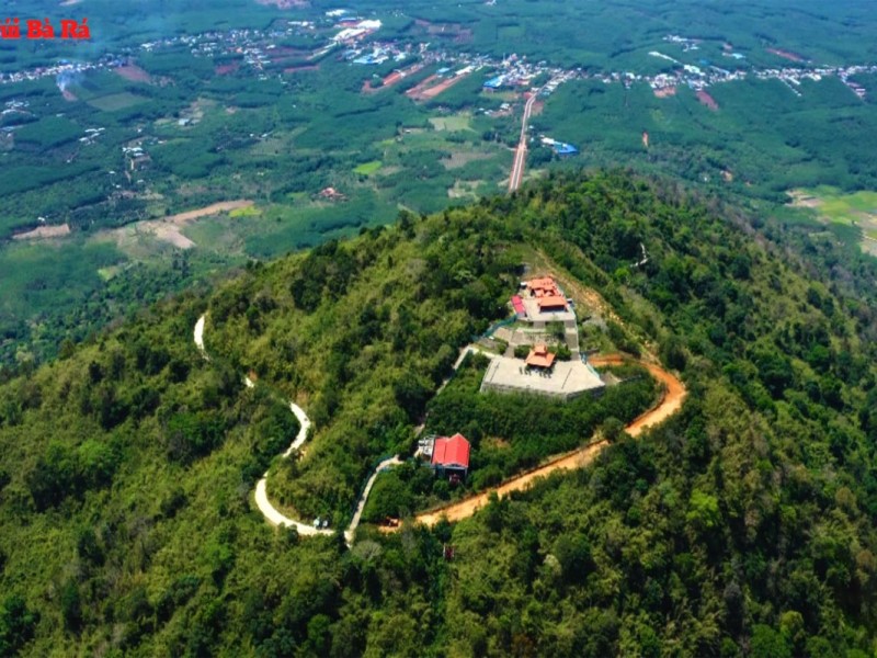 Ba Ra Mountain in Binh Phuoc, Vietnam, offering scenic views of lush green forests.